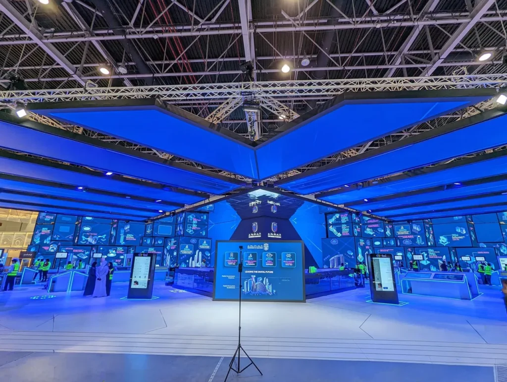 Multi-surface display installation at the Abu Dhabi Government Pavilion during GITEX Global 2022 — view 5