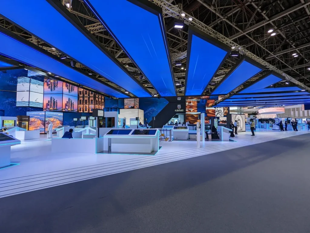 Multi-surface display installation at the Abu Dhabi Government Pavilion during GITEX Global 2022 — view 7
